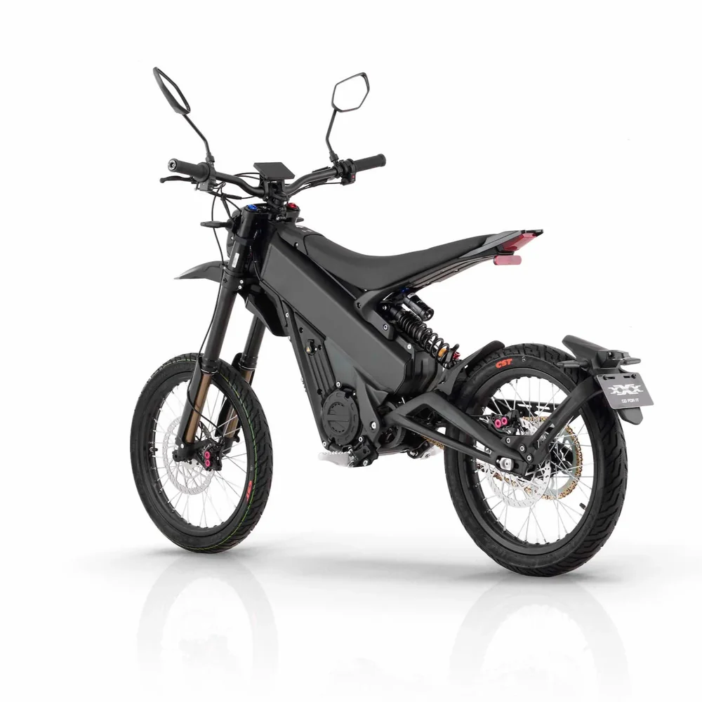 Talaria X3 Pro 5kw Electric Dirt Bike Talaria X3 Pro 5kw Electric Bike transitioning from urban street to a light off-road trail in Europe.