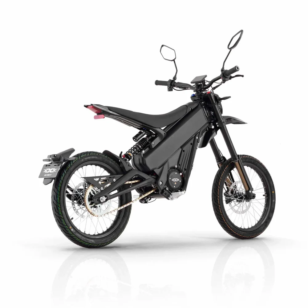 Talaria X3 Pro 5kw Electric Dirt Bike Talaria X3 Pro 5kw Electric Bike transitioning from urban street to a light off-road trail in Europe.