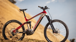 The 2023 Corratec E-Power RS 160 Pro electric mountain bike in a unique Sand color, featuring 160mm full suspension, Bosch Performance Line CX motor, 750Wh battery, and a Mullet wheel setup for premium European enduro riding.