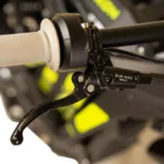Sur Ron Light Bee-X Sur Ron Light Bee-X electric dirt bike rider navigating a challenging forest trail in Europe.